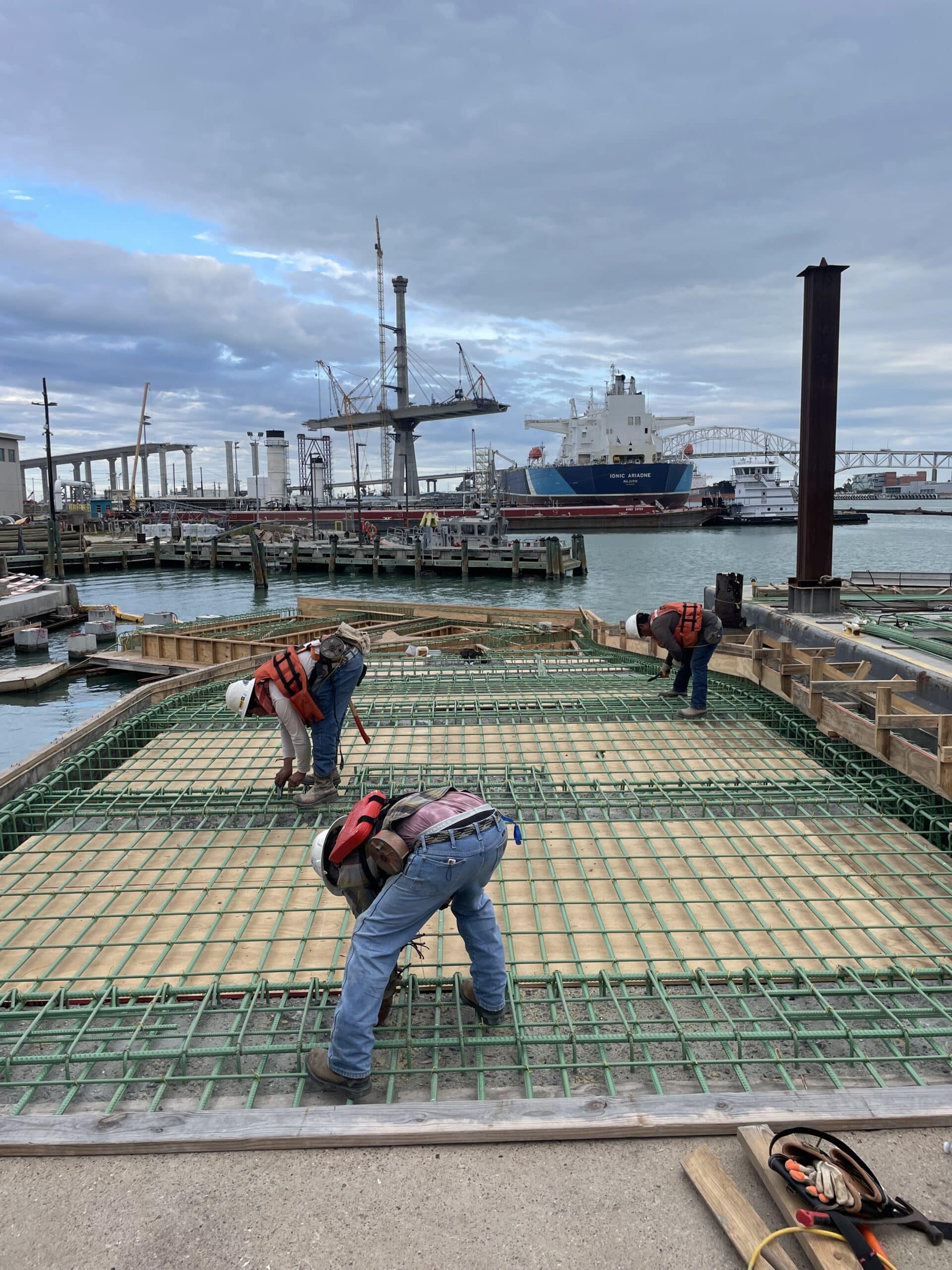 Marine Construction project in progress, construction workers at work | Inland Construction & Engineering, Inc. Panama City, Florida providing construction, general contracting, marine construction, design & engineering, diving services, roofing, & bulding rehab.